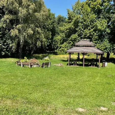With A Large Garden And Playground
