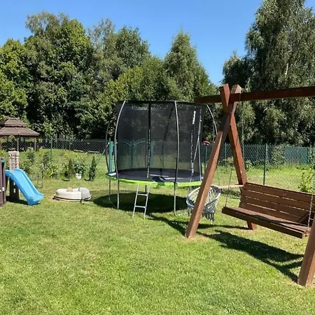 With A Large Garden And Playground *